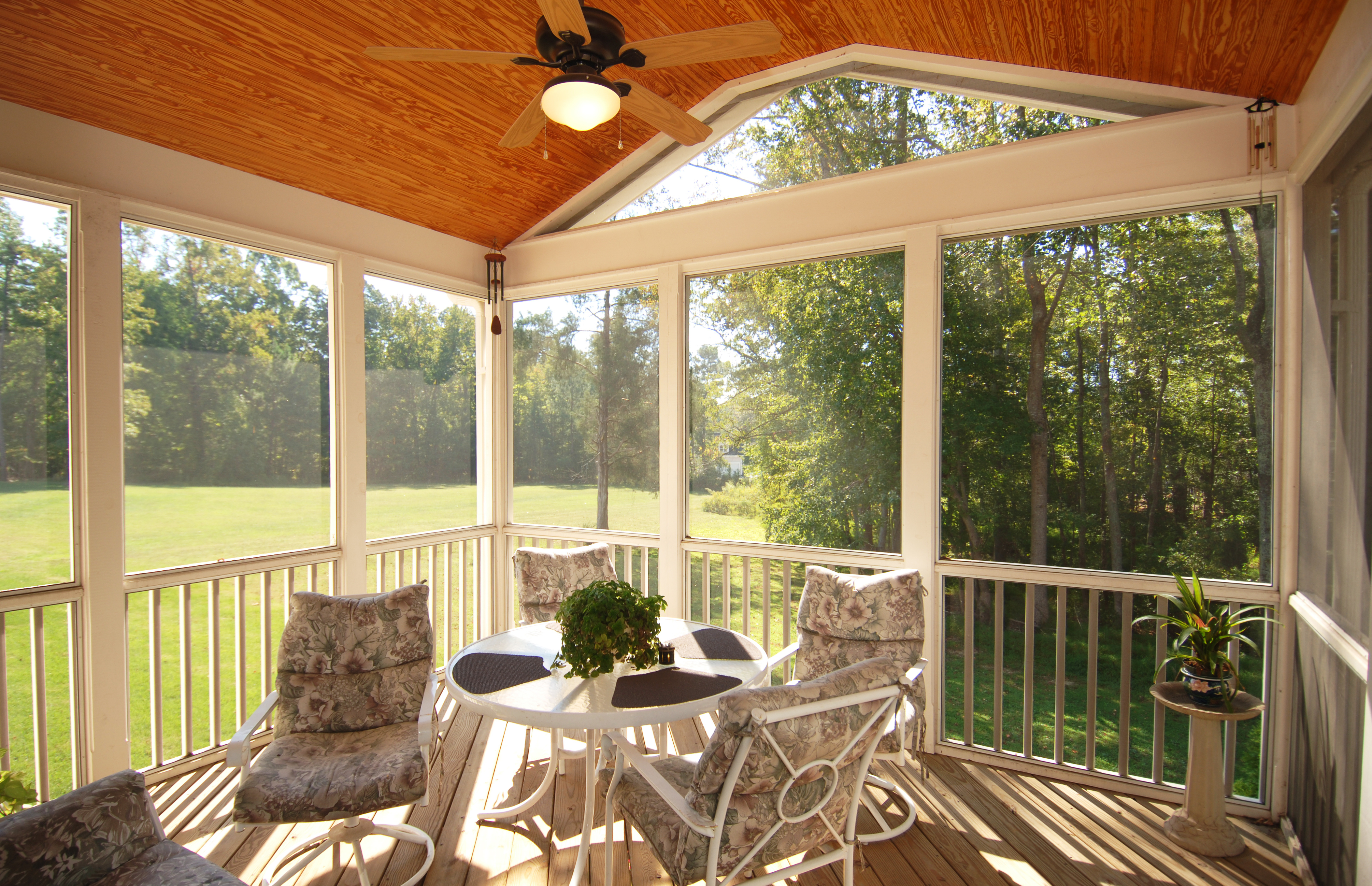 A beautiful coastal-style patio enclosure that is perfect to relax and enjoy the outdoors.