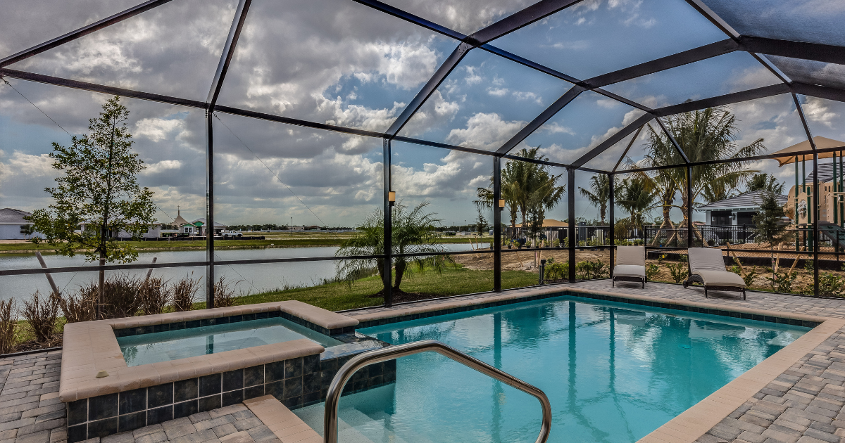 A beautiful Florida pool enclosure overlooks the intercoastal waterway.