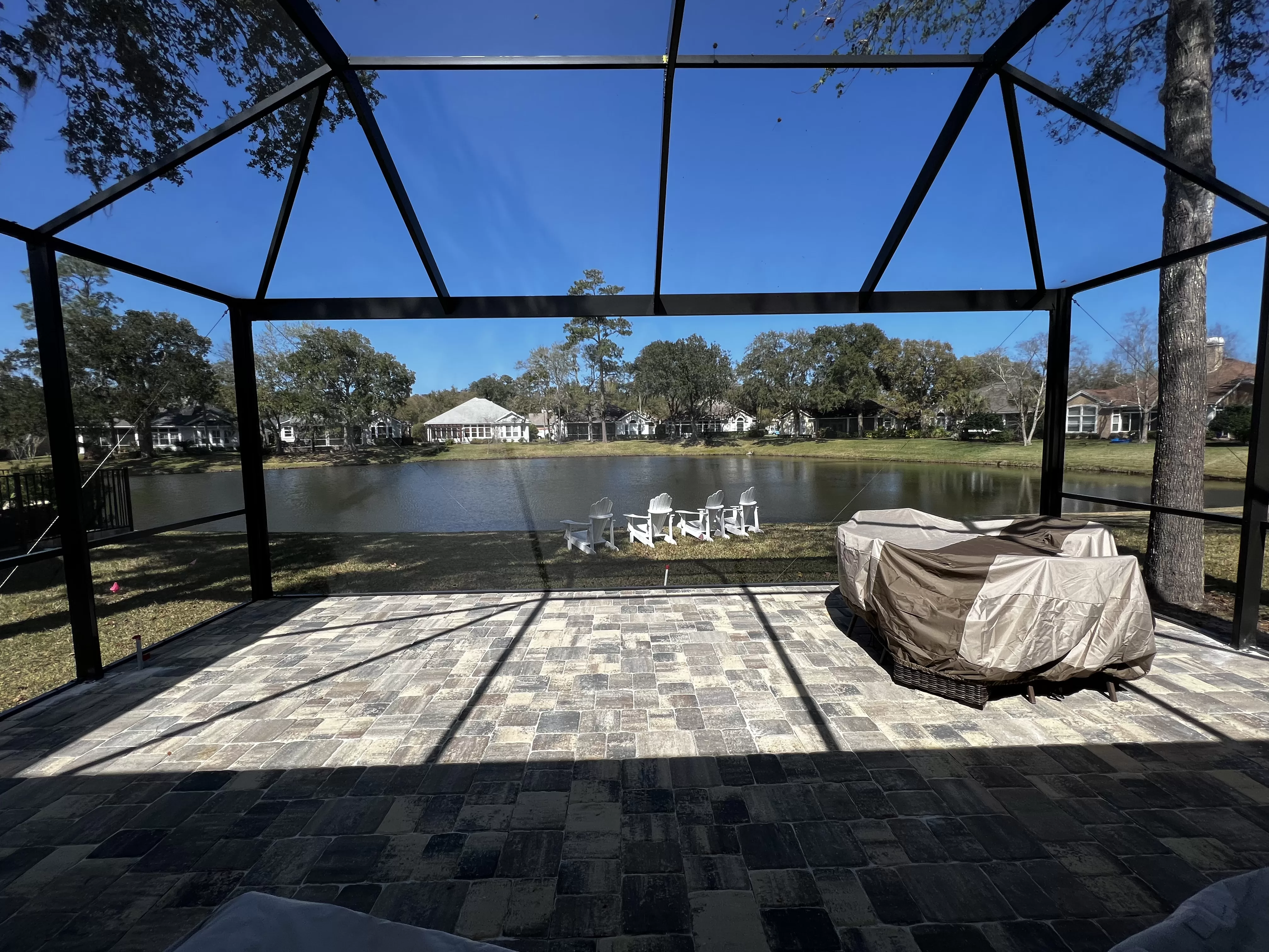 This screen enclosure allows you to take in the sights of this beautiful lake without and obstructed view.