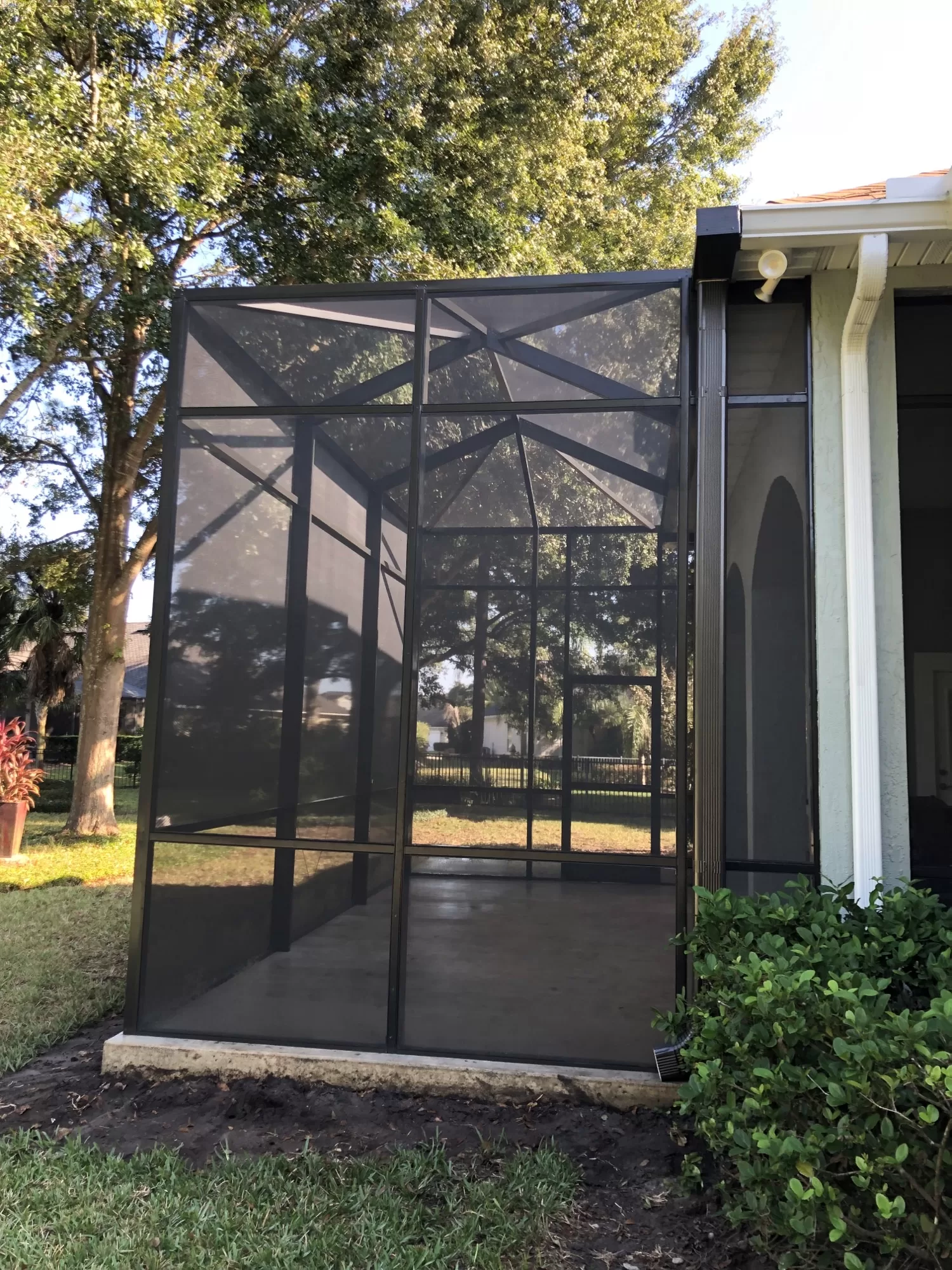 This custom bird cage build extends the homeowners patio and provides protection from insects, dirt and debris.